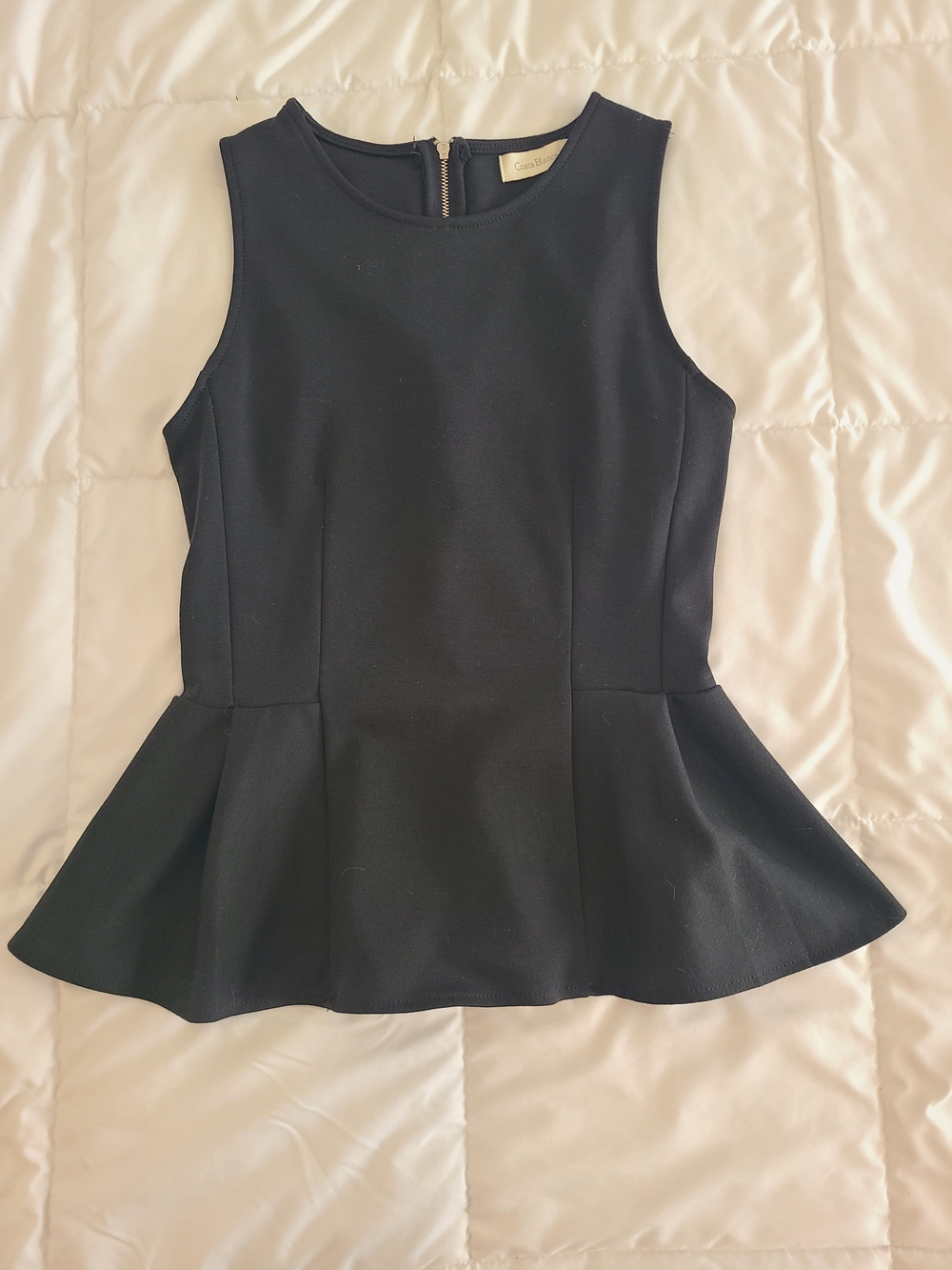 Sleeveless Black Peplum Top